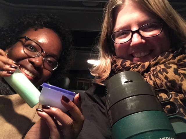 Seyi and Rachel sheltering from the cold