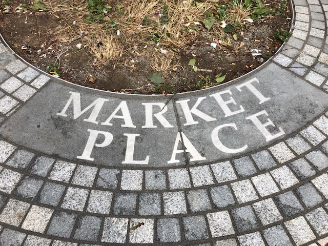 stone with 'market place' engraved into it